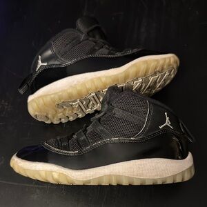 Jordan 11 Black High-Top Sneakers with Durable Sole